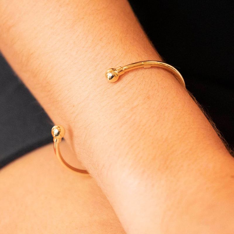 9K Yellow Gold 2.5mm Tube 62mm x 50mm Torque Bangle